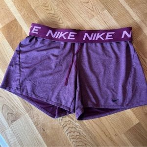 Womens size Medium Nike athletic Dry Fit Running Cheer Dance shorts Mauve Pink